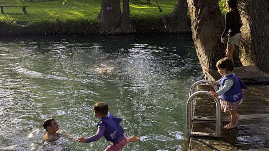 Photo by Teresa Kendrick Wimberley Parks and Rec gets ready for swim season at Blue Hole, May 1.