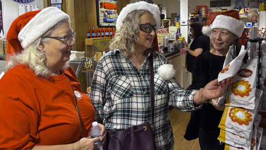 Photo by Teresa Kendrick Kim Simon-Taylor, right, hosts longtime friends to a Hometown Holiday in Wimberley