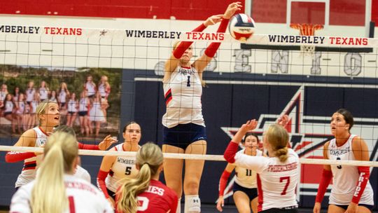 Lady Texans stay perfect in district play