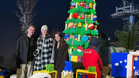 Photo by Denise Summers FOX’s Season 5 LEGO Masters Ian, left, and Sage Summers, center, pose with Brick Master and Judge on FOX LEGO Masters program Amy Corbett as they officially light the NYC LEGOLAND Christmas Tree.