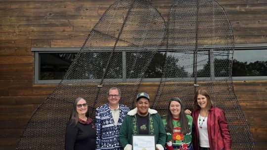 Photo by Lindsey Deringer Taking the Winter Wonderland award was The Leaning Pear. Decorators include Kathy Locke, left, Matthew Buchanan, Adrian Casteñeda, Rachel Buchanan and Linda Swift.