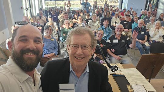 Photo by Dalton Sweat Regional Editor Dalton Sweat, left, Founder Dr. Patrick Cox, writers and the Wimberley community celebrate the 50th anniversary of the Wimberley View.