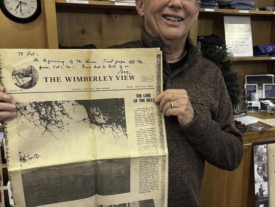 Submitted Photo Dr. Patrick Cox with the first edition of the Wimberley View.