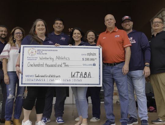 Booster Club donates $100K to WISD Athletics