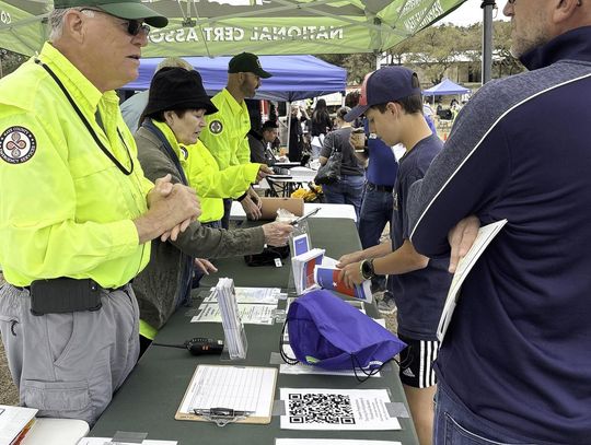 CERT volunteers answer questions about their lifesaving activities during the Wimberley Preparedness Fair. Photo by Teresa Kendrick