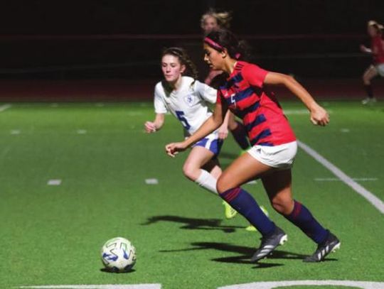 Girls’ soccer clings to slim district lead