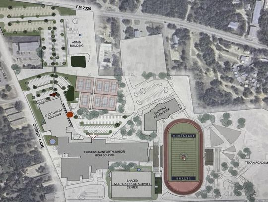 Submitted site plan On the map, the red circle next to the planned Auditorium Addition shows where trees number 1, 2 and 3 will be removed. The blue circle adjacent to the Shaded Pavilion shows the location of heritage tree number 4.