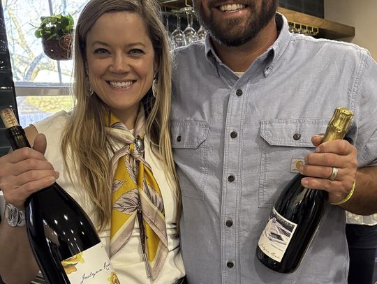 Jaclynn van Sant Downes and Justin Downes at the grand opening of the Jaclynn Renée Wine Collective in the former Social on the Square space. Photo by Teresa Kendrick