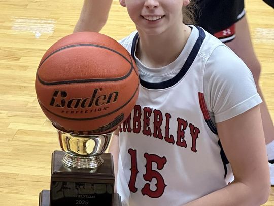 Photo submitted by Wimberley ISD Ainsley Stotley holds her trophy after winning the three-point contest at the Fairfield Tournament. 