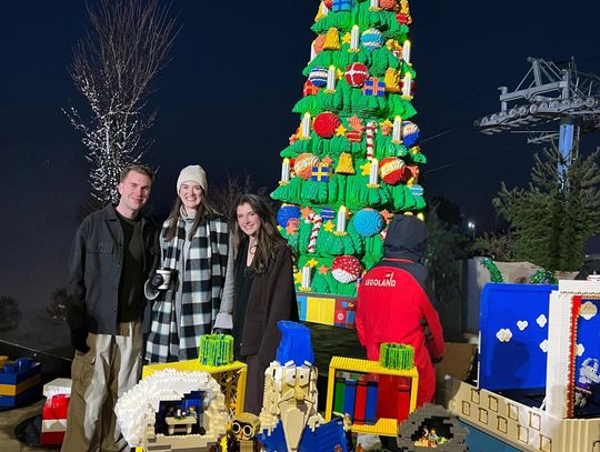 Photo by Denise Summers FOX’s Season 5 LEGO Masters Ian, left, and Sage Summers, center, pose with Brick Master and Judge on FOX LEGO Masters program Amy Corbett as they officially light the NYC LEGOLAND Christmas Tree.