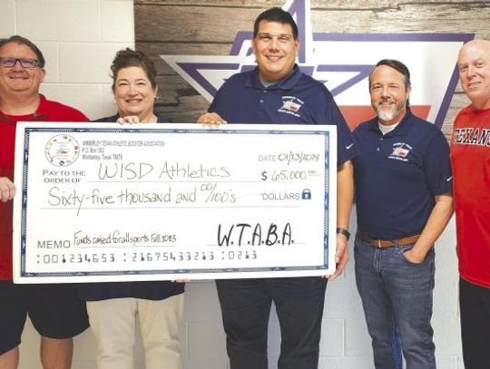 Texan Boosters present check for $65,000