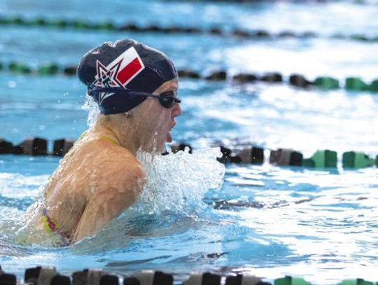 Texan Swim Team competes at district 14-4A meet