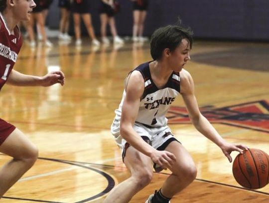 Varsity boys Basketball edge Fredericksburg 67 to 65