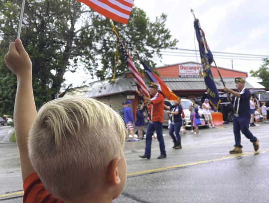 Wimberley enjoys a damp good parade