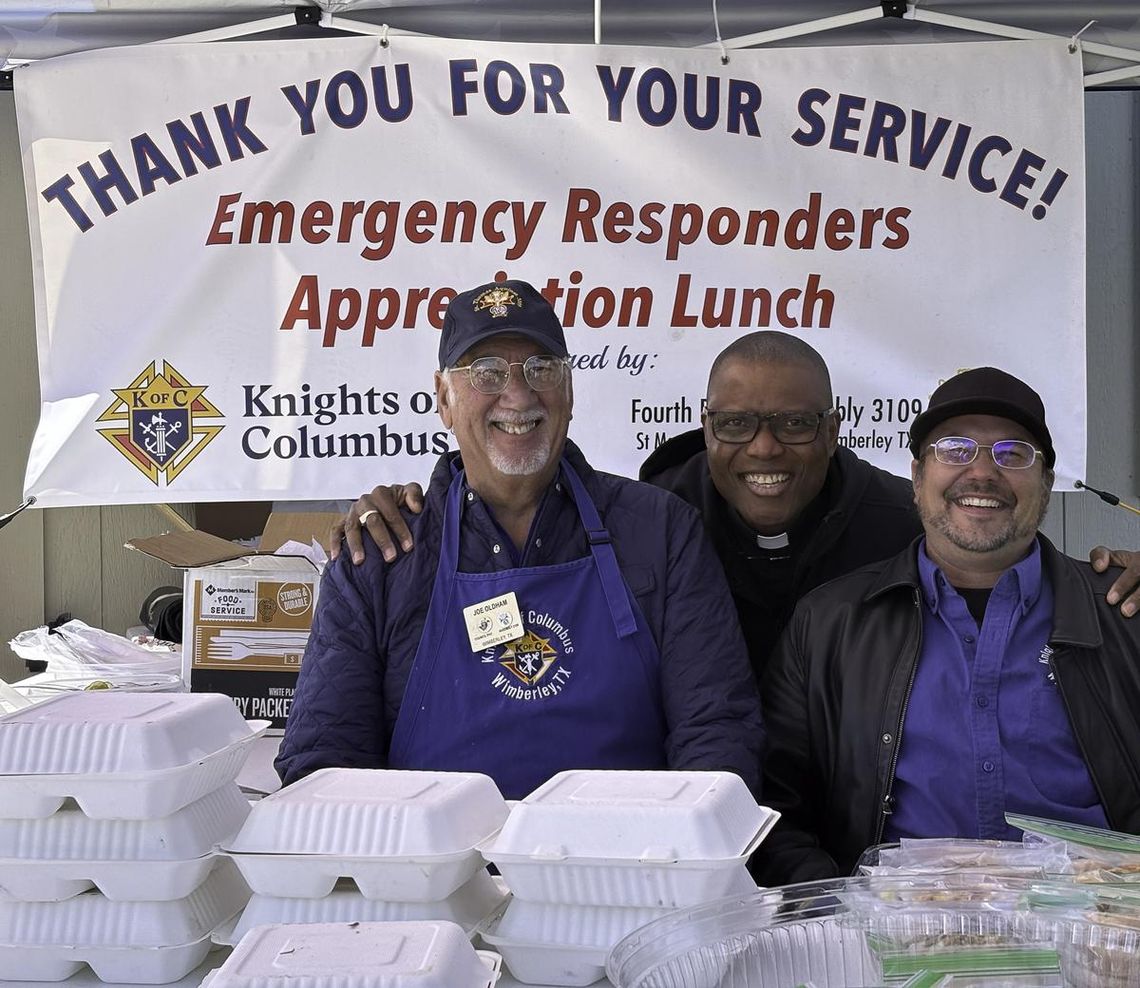 Photo by Teresa Kendrick Joe Oldham, Fr. Chris Unachukwu and Jason Foreman hand out delicious barbecue meals and smiles at the annual luncheon to acknowledge first responders.