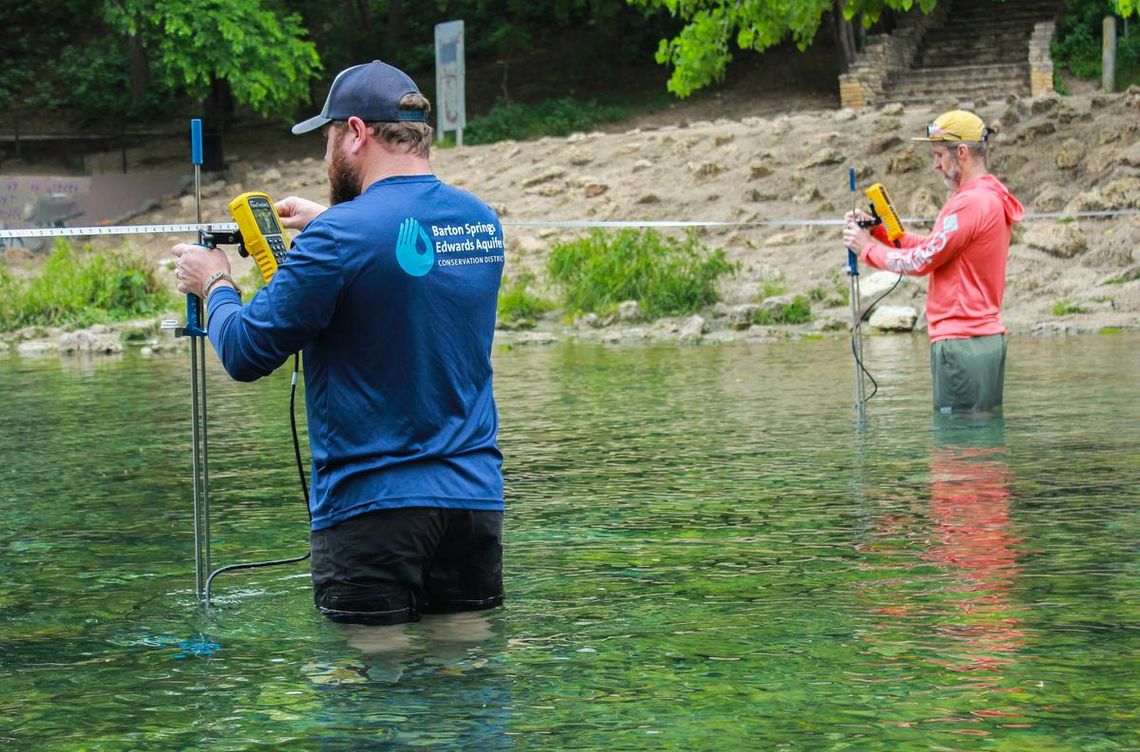 First Ever Stage 4 Emergency for Edwards Aquifer Photos of District staff measuring groundwater levels and springflow Submitted Photo