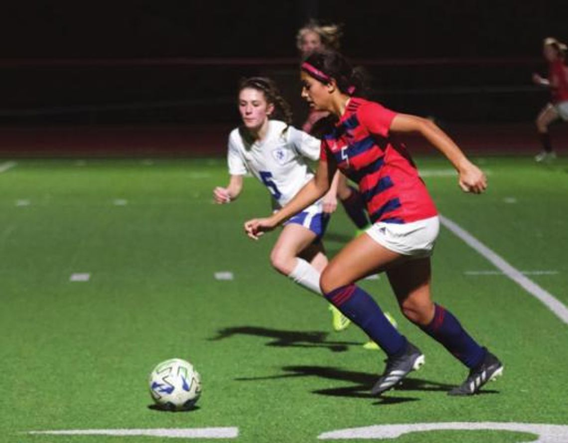 Girls’ soccer clings to slim district lead