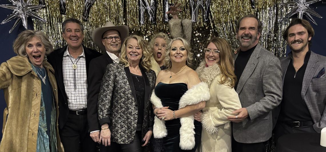 Hill Country Home Companion Posing after the performance are HCHC writers and performers: Monica Michell, Bruce Levinson, David Bisett, Roxanne Strobel, Carla Daws, Molly Poorboy, Reji Smith, Danny Mosier and Samuel Ellisor. Photo by Teresa Kendrick