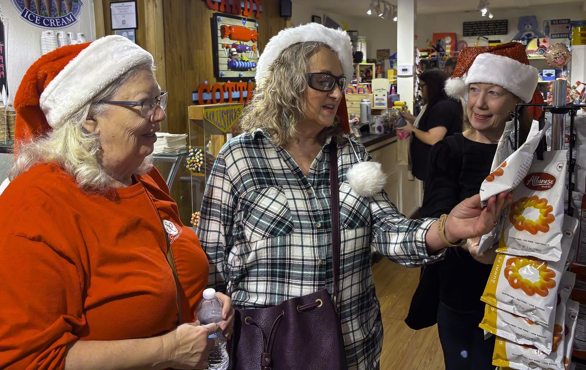 Photo by Teresa Kendrick Kim Simon-Taylor, right, hosts longtime friends to a Hometown Holiday in Wimberley