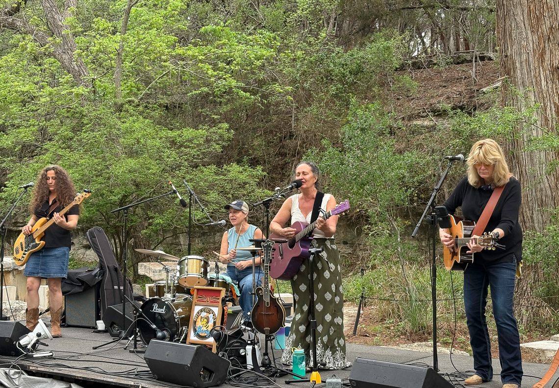 Honeys ing away the rain Amber Lucille, Monday Turner, Rose Gabriel and Sloan Michael of the HIll Country Honeys. Photo by Teresa Kendrick