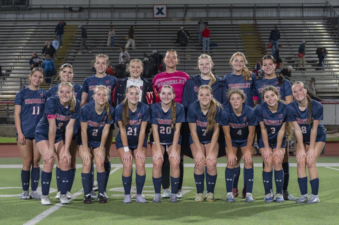 Lady Texans continue to roll through district Photo by Julie Albini/albini.smugmug.com Lady Texans pose for team picture after their victory over Marble Falls.