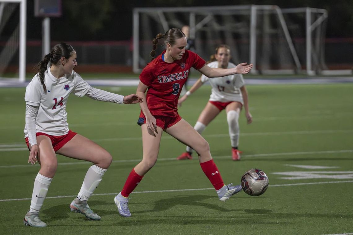 Cameron Thames #9 moves the ball down field. Photo by Julie Albini/albini.smugmug.com