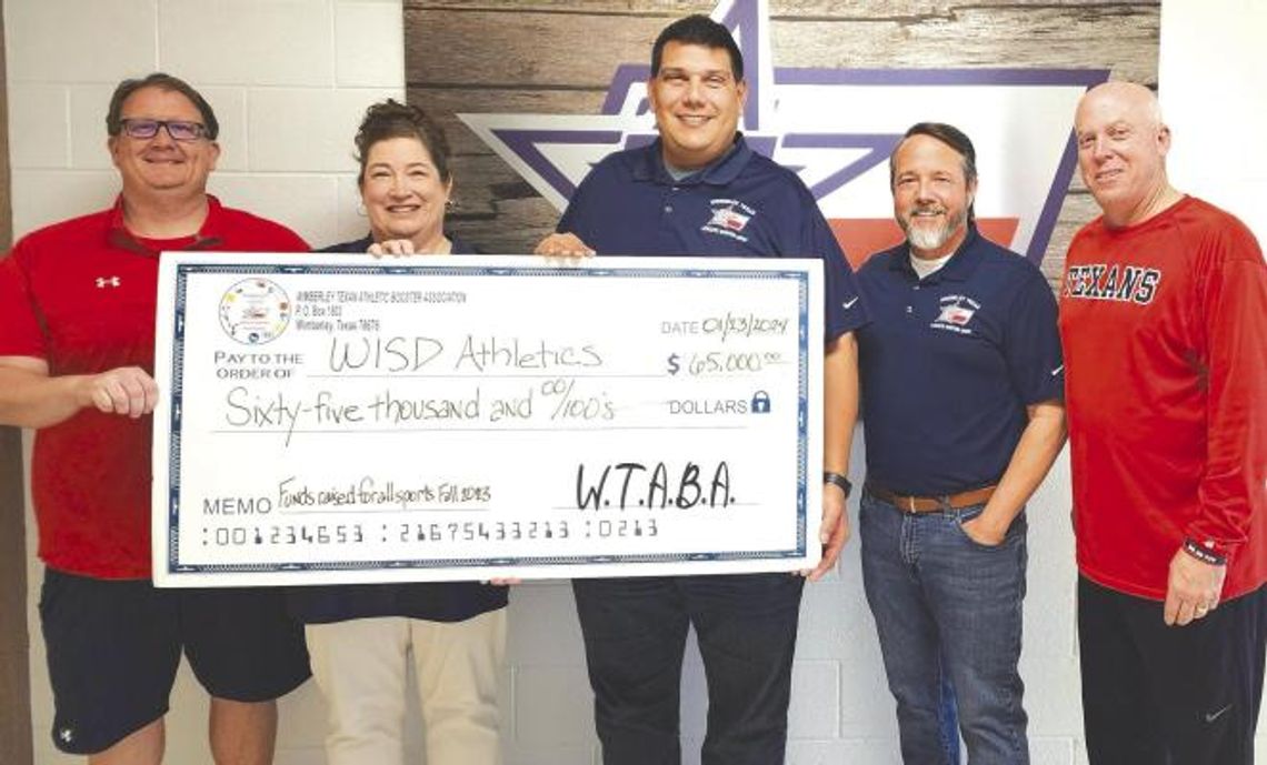 Texan Boosters present check for $65,000