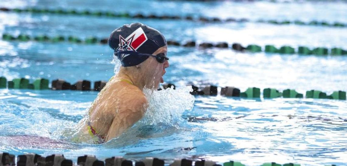 Texan Swim Team competes at district 14-4A meet