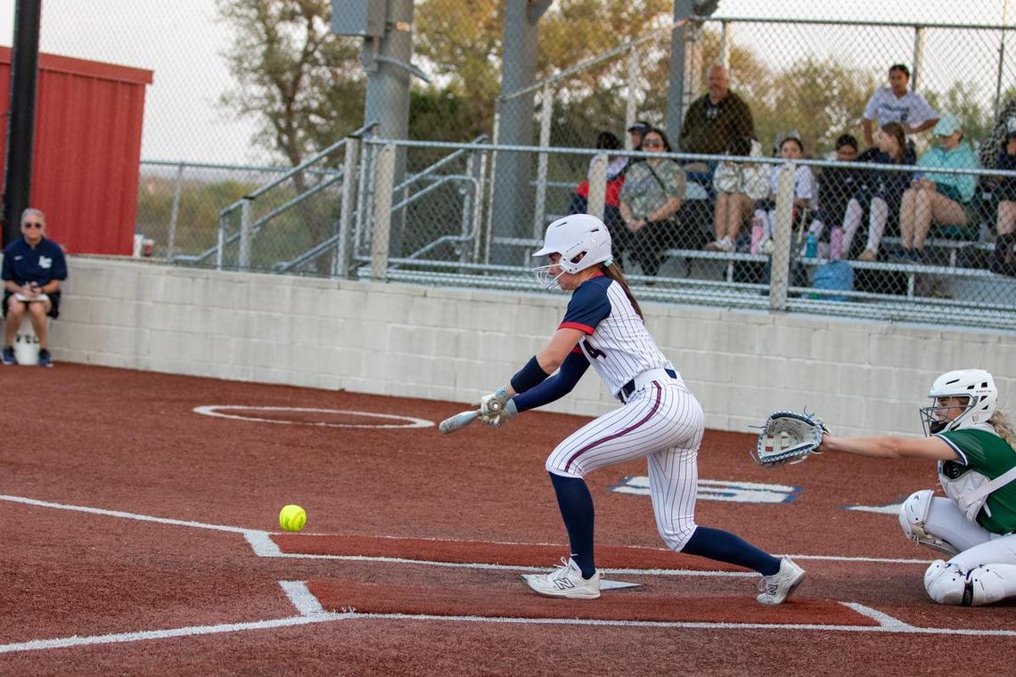 Photo by Paul Mayhew/paulmayhewphotography.com Battling at the plate isAnsley Davis, #4.
