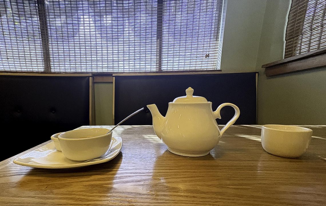 Under the weather? Get thee to tea at Bamboo Gardens Photo by Teresa Kendrick Hot tea is served in a large gleaming pot at Bamboo Garden.
