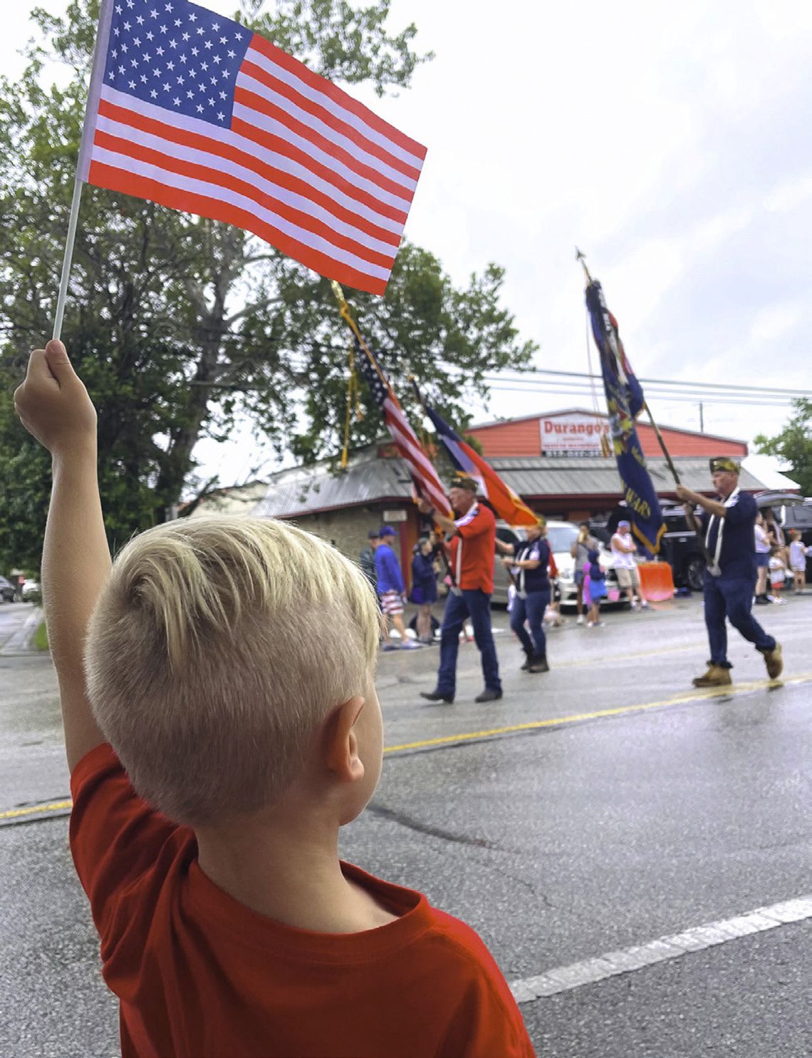 Wimberley enjoys a damp good parade