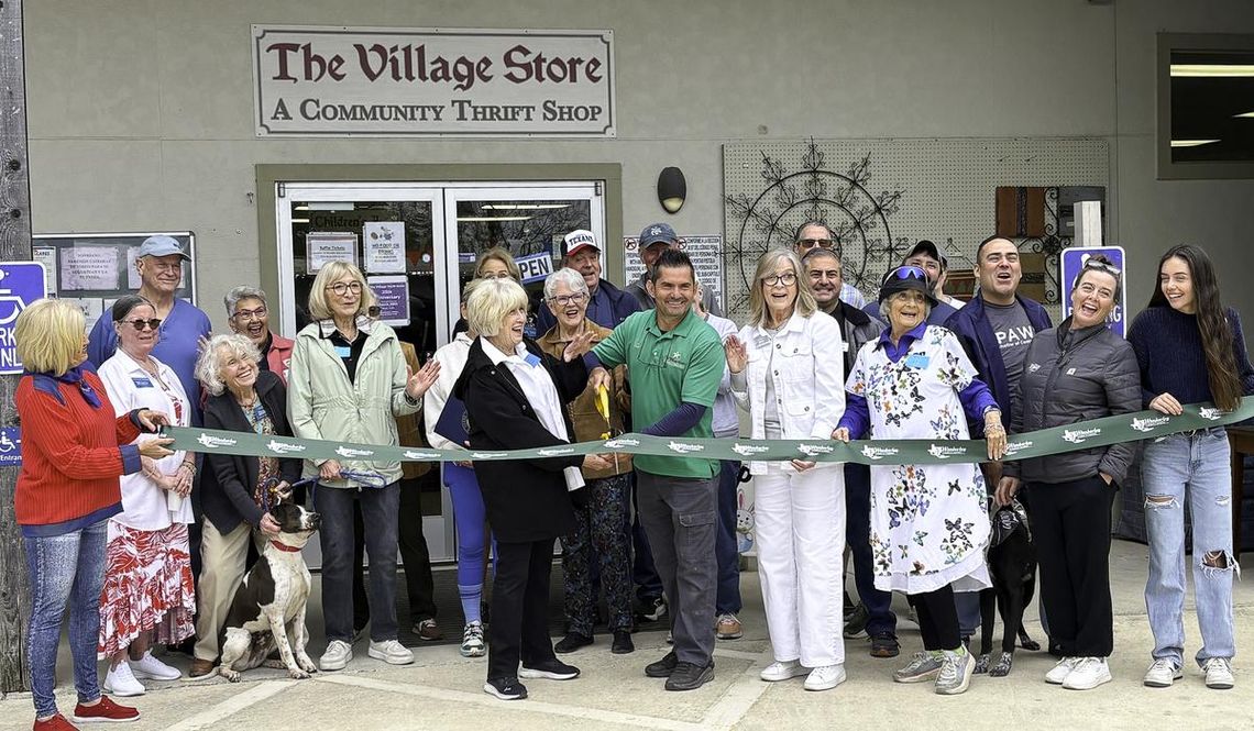 Photo by Teresa Kendrick The Village Store celebrates 25 years of giving back with a ribbon Cutting.