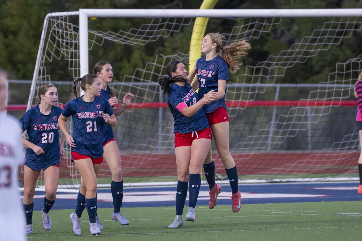 Photo by Julie Albini/albini.smugmug.com Celebration after Lilli Sandoval, #1...