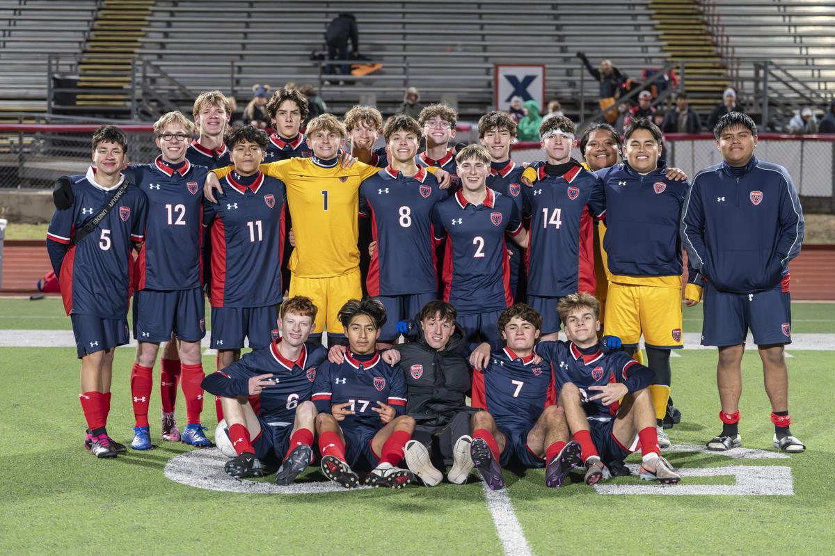 The Texans celebrate after defeating Marble Falls 2-1 for their first ever wi...