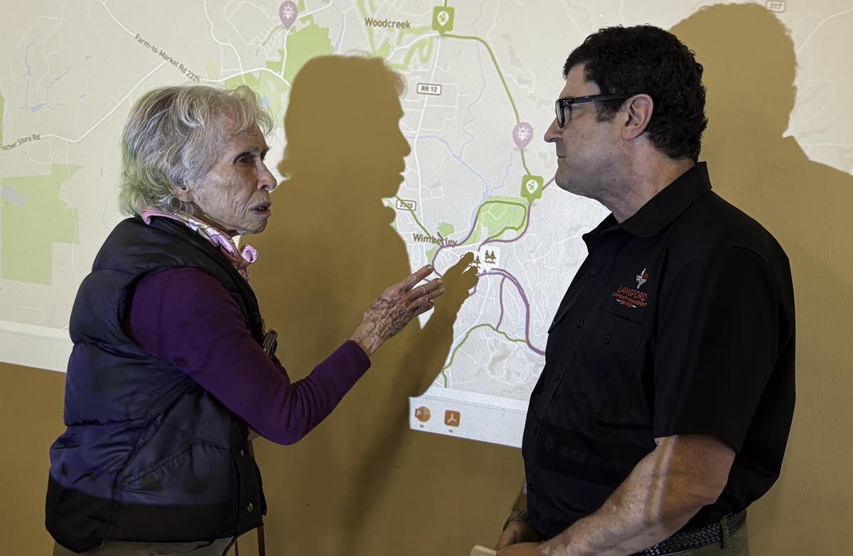 Nancy Russell offers feedback to Tim Jenkins of Langford Community Management...