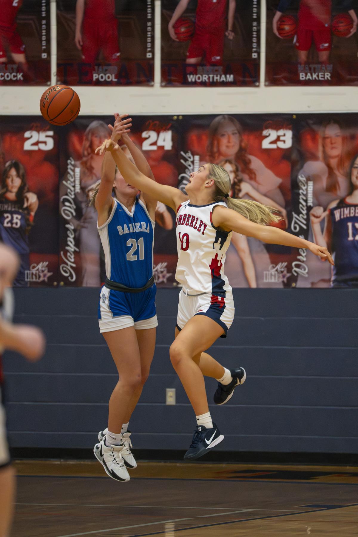 Photo by Julie Albini/albini.smugmug.com Victoria Jones, #10, blocks the shot.