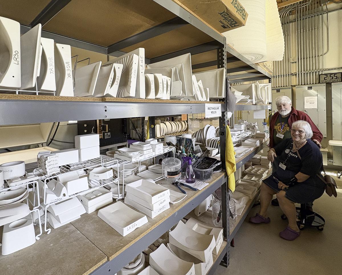 Photo by Teresa Kendrick Owners Chester John and Elissa Beach-John with some...