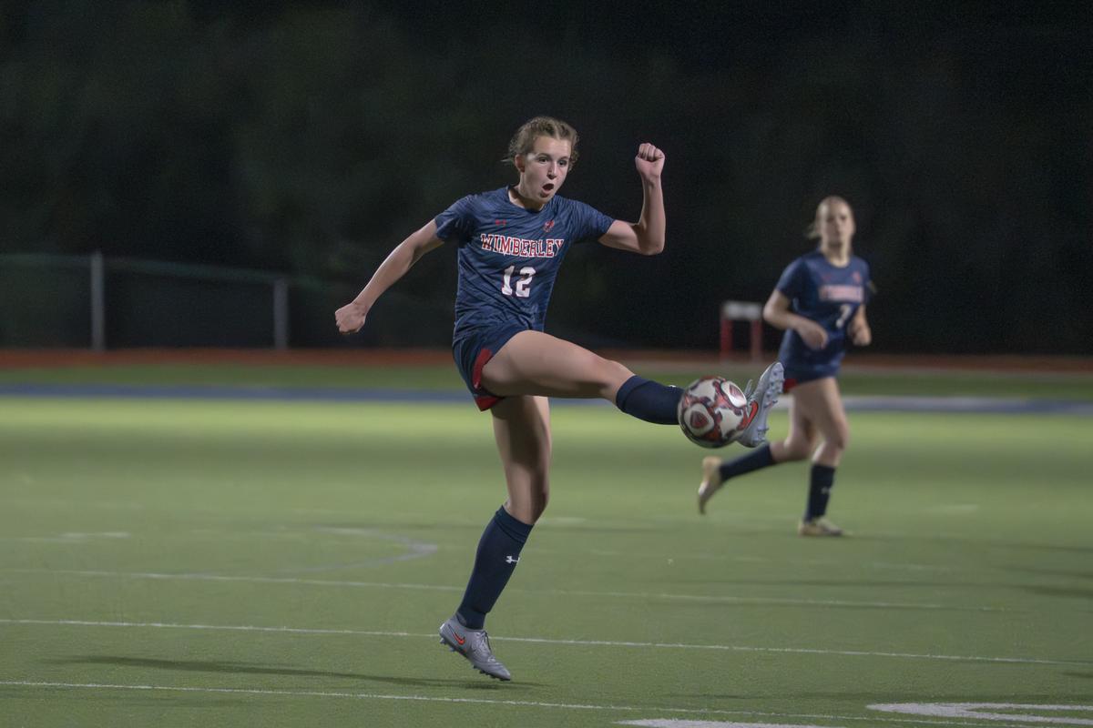 Photo by Julie Albini/albini.smugmug.com Trinity Laney, #12, with the ball.