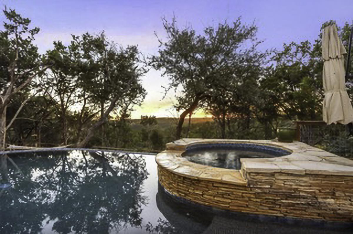 Tucked quietly into the landscape is the peaceful “Casa Colinas” that has a l...