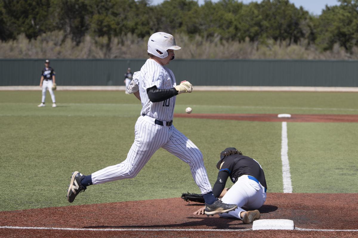 Photo by Julie Albini/albini.smugmug.com Jayden Hall, #10, safe at first base