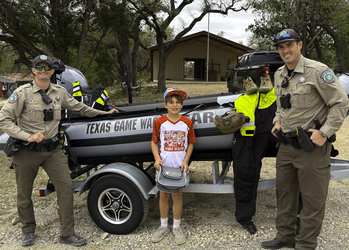 Photo by Teresa Kendrick Texas Game Wardens Kyle Reece, left and Adam Broll,...