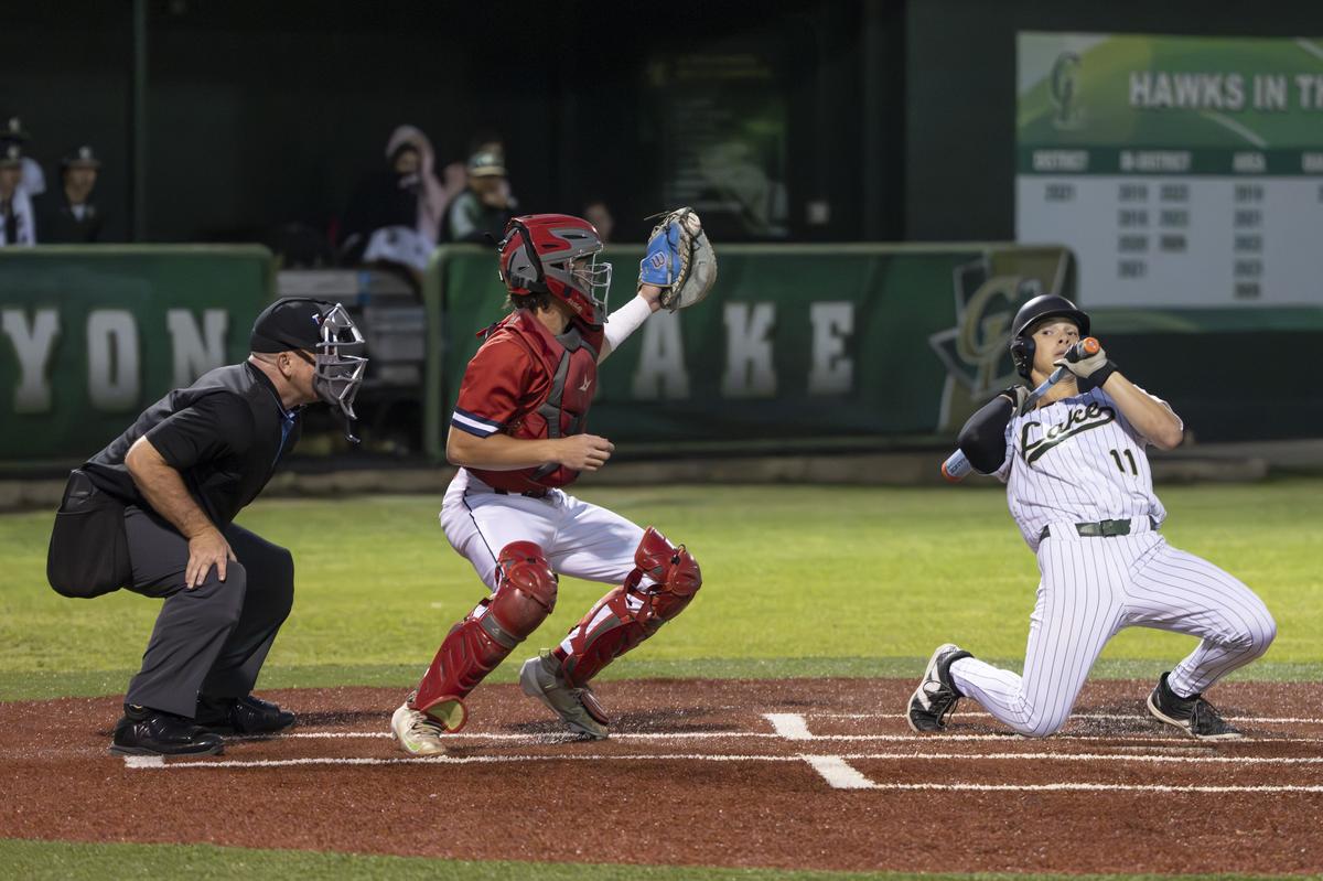 Photo by Julie Albini/albini.smugmug.com Game 2: Jake Dewell, #11, saves a cr...