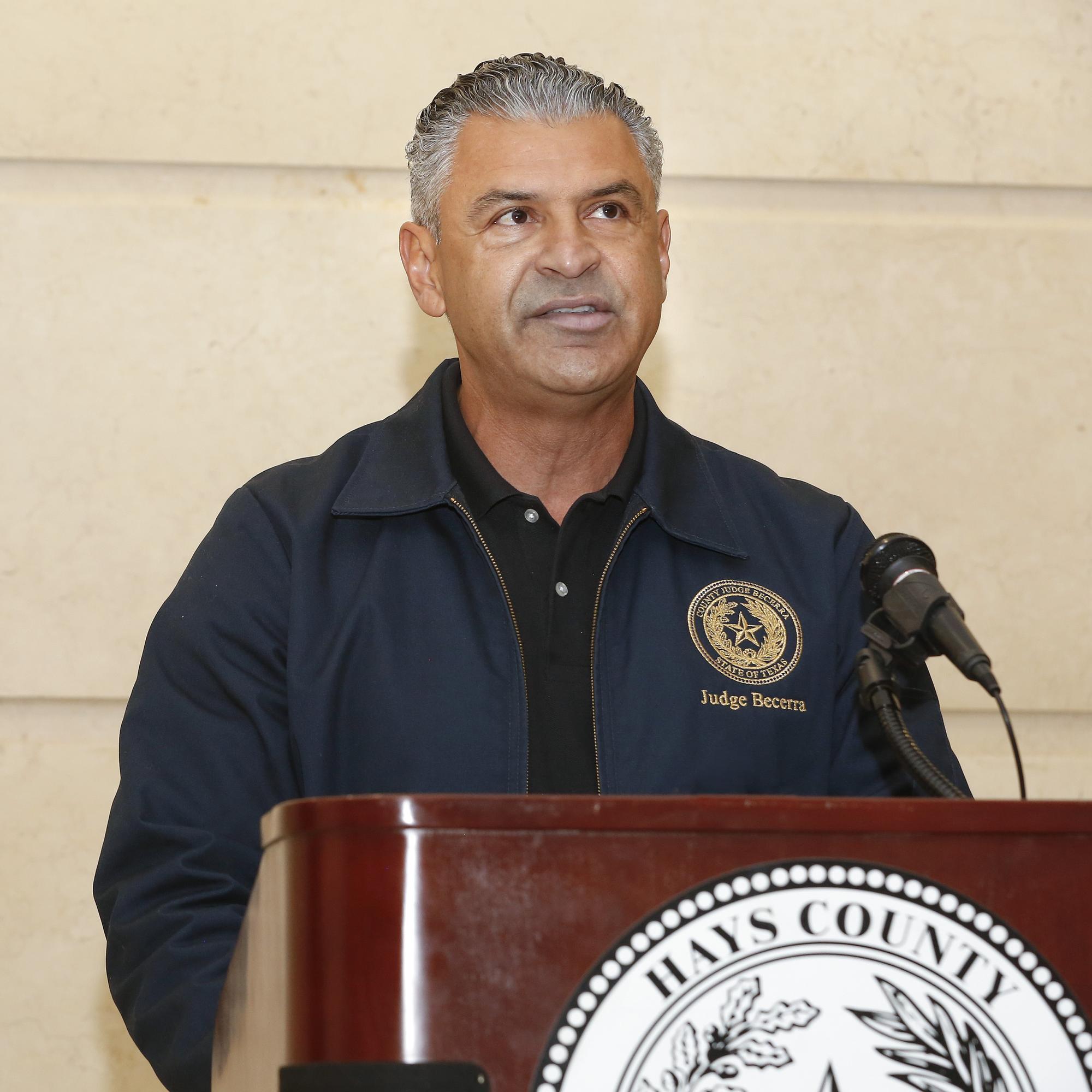 Daily Record photo by John Clark Hays County Judge Ruben Becerra spoke at the...