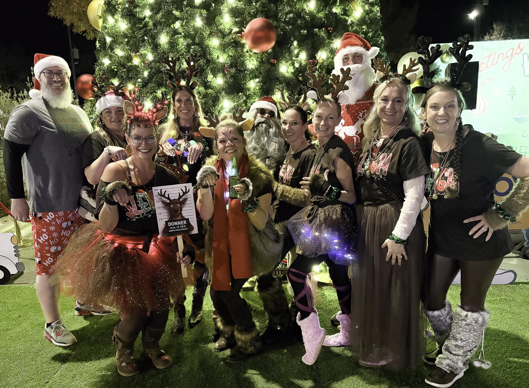 Photo by Teresa Kendrick In full seasonal regalia, the Donner clan poses in f...