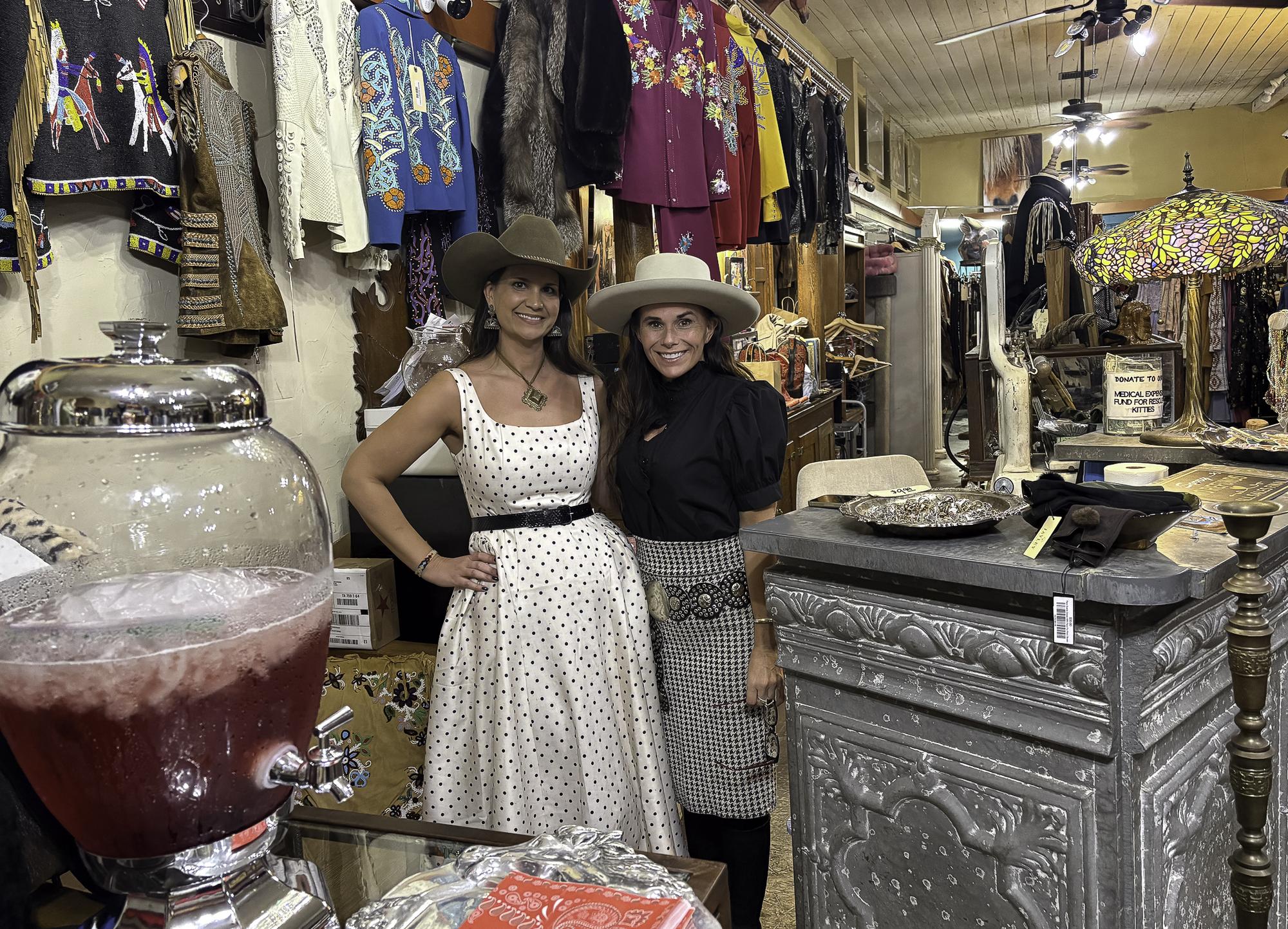 Photo by Teresa Kendrick At Wall Street Western, Cup of Cheer shoppers are tr...
